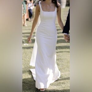 Custom, fitted square neck wedding dress.